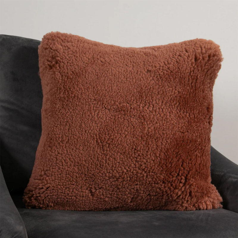 Talia Plain Sheepskin Cushion in Coral Orange