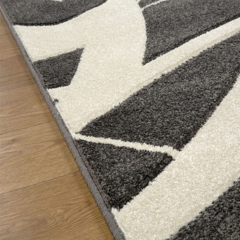 Portland 57 E Abstract Carved Runner Rugs in Charcoal Cream