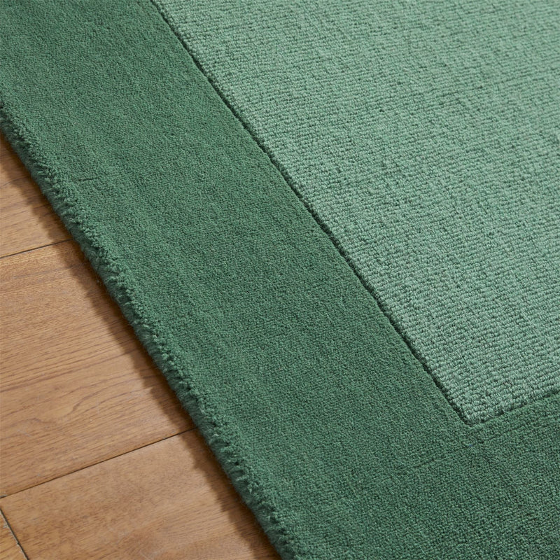 Colours Bordered Wool Rug in Green
