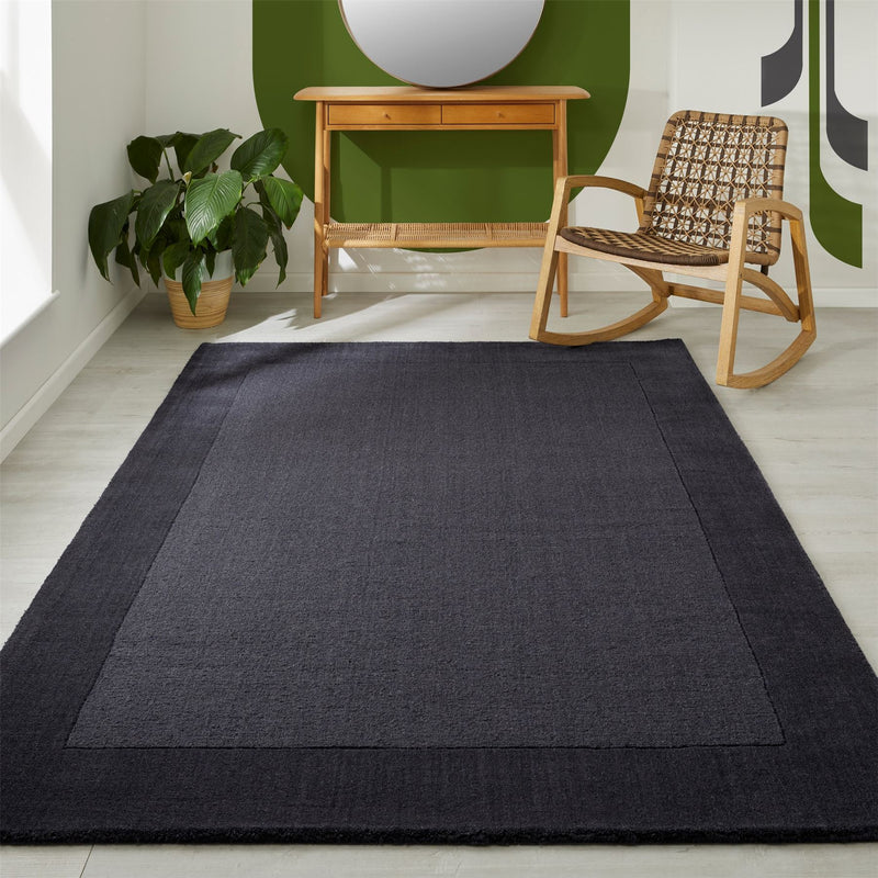 Colours Bordered Wool Rug in Charcoal Grey