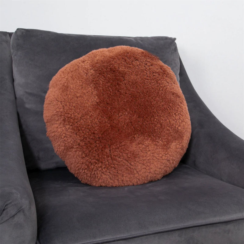Talia Round Sheepskin Cushion in Coral Orange